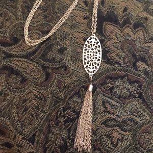 long gold statement necklace